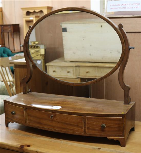 A George III mahogany toilet mirror, W.2ft